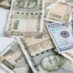 Rupee vs Dollar: रुपये को गिरने से बचाने के लिए RBI क्यों बेचता है विदेशी मुद्रा? क्यों जरूरी है डॉलर की बिक्री?