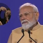 PM मोदी के पीछे खड़ी लड़की ने ऐसा क्या किया इशारा, पलटकर देखने लगे प्रधानमंत्री, रिएक्शन वायरल